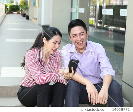 Man woman business executive outdoor pose relax sit on stair phone Man woman business executive outdoor pose relax sit on stair phone 14059771