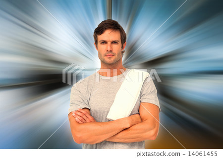 Composite image of portrait of a fit young man with towel Composite image of portrait of a fit young man with towel 14061455
