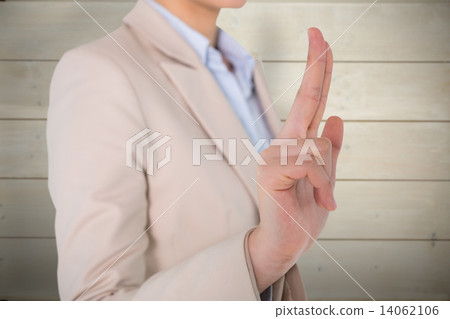 Composite image of businesswoman touching 14062106
