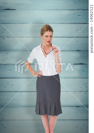 Composite image of thinking businesswoman Composite image of thinking businesswoman 14062521