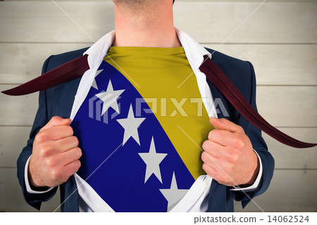 Composite image of businessman opening shirt to reveal bosnia fl 14062524