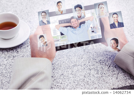 Composite image of cheerful creative business employee resting Composite image of cheerful creative business employee resting 14062734