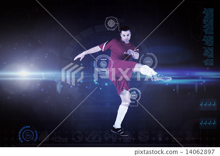 Composite image of football player in red kicking Composite image of football player in red kicking 14062897