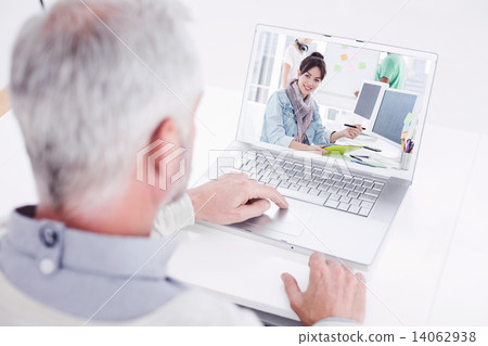Composite image of closeup rear view of a grey haired man using Composite image of closeup rear view of a grey haired man using 14062938