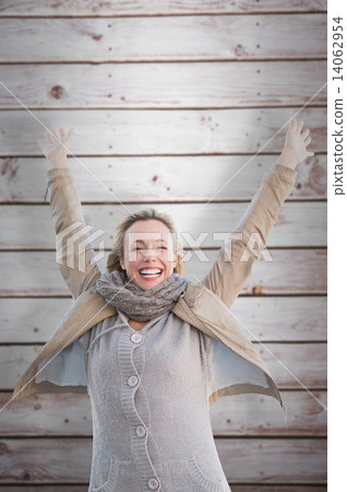 Composite image of cheering blonde Composite image of cheering blonde 14062954