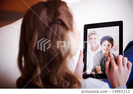 Composite image of portrait of a smiling family Composite image of portrait of a smiling family 14063212