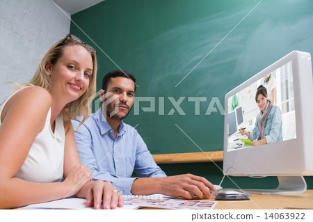 Composite image of artist drawing something on graphic tablet wi Composite image of artist drawing something on graphic tablet wi 14063922