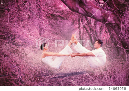 Composite image of peaceful couple sitting in boat position toge Composite image of peaceful couple sitting in boat position toge 14063956