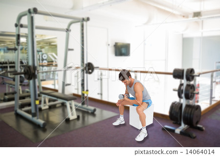 Composite image of side view of a fit man exercising with dumbbe Composite image of side view of a fit man exercising with dumbbe 14064014