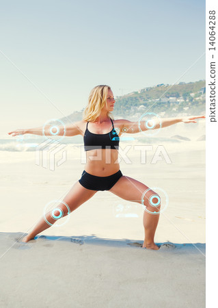 Composite image of fit blonde in warrior pose on the beach Composite image of fit blonde in warrior pose on the beach 14064288