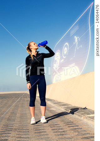 Composite image of fit blonde drinking water on the pier Composite image of fit blonde drinking water on the pier 14064476