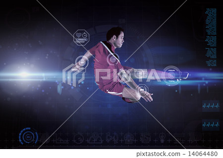Composite image of football player in red kicking Composite image of football player in red kicking 14064480