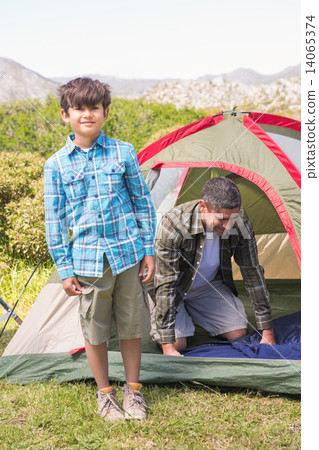 Father and son in their tent Father and son in their tent 14065374