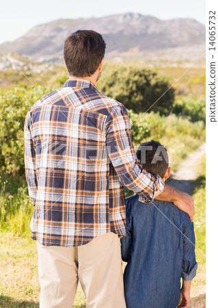 Father and son on a hike together 14065732