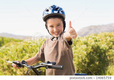 Little boy on a bike ride 14065759