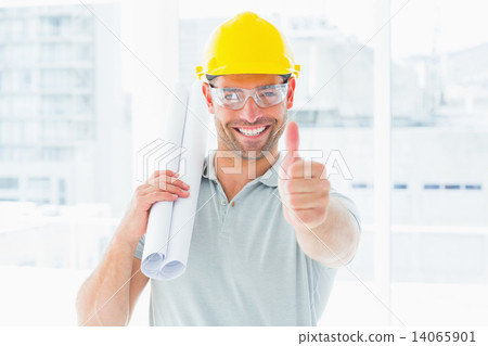 Happy handyman with rolled up blueprint gesturing thumbs up Happy handyman with rolled up blueprint gesturing thumbs up 14065901