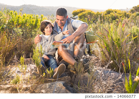 Father and son hiking in the mountains Father and son hiking in the mountains 14066077