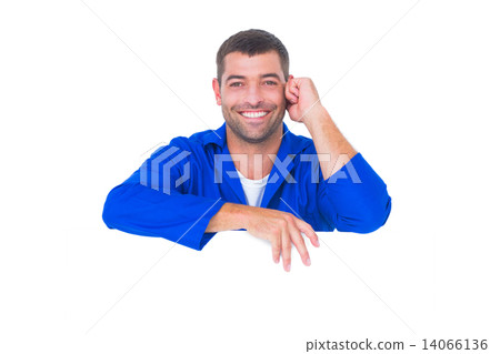 Handsome mechanic with blank placard Handsome mechanic with blank placard 14066136
