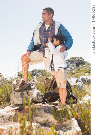 Father and son hiking in the mountains Father and son hiking in the mountains 14066255