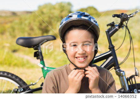 Little boy on a bike ride Little boy on a bike ride 14066352