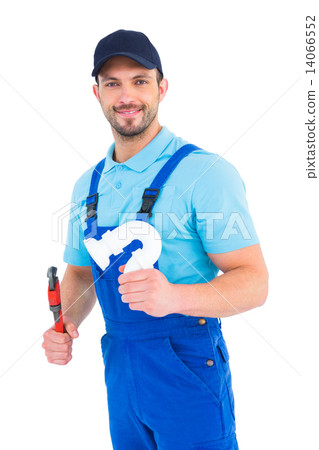 Handsome male plumber holding sink pipe Handsome male plumber holding sink pipe 14066552