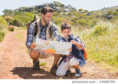 Father and son hiking in the mountains Father and son hiking in the mountains 14066760