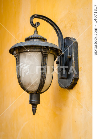 Lantern on a yellow wall Lantern on a yellow wall 14071817
