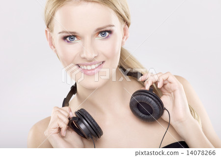 Beautiful girl is listen to the music Beautiful girl is listen to the music 14078266