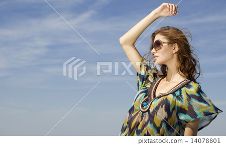 beautiful girl in sunglasses on background blue sky beautiful girl in sunglasses on background blue sky 14078801
