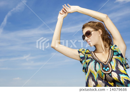 beautiful girl in sunglasses on background blue sky beautiful girl in sunglasses on background blue sky 14079686