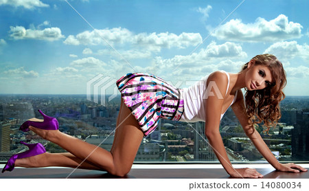 brunette on the background of the city 14080034