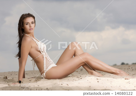 young fashion pretty sexy woman on the beach 14080122