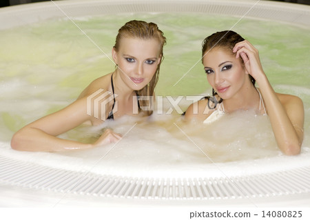 Two young beautiful girls in jacuzzi Two young beautiful girls in jacuzzi 14080825