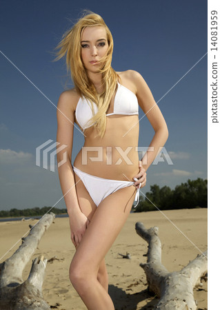 beautiful blonde woman in white bikini beautiful blonde woman in white bikini 14081959