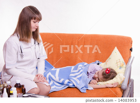 Pediatrician looks at the crying of a sick child Pediatrician looks at the crying of a sick child 14083953