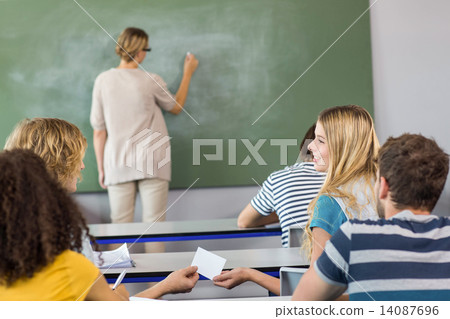 Teacher teaching students in class Teacher teaching students in class 14087696