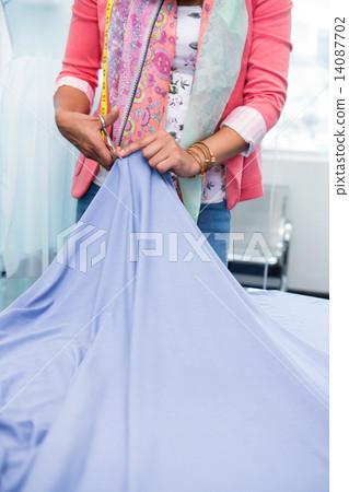 Female fashion designer at work 14087702