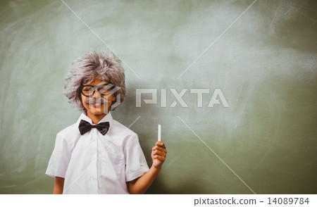 Stock Photo: Boy dressed as senior teacher in front of blackboard