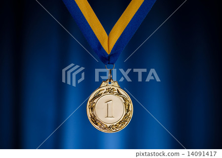 Gold medal on a dark blue background Gold medal on a dark blue background 14091417
