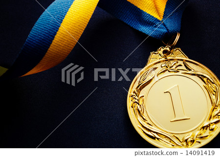 Gold medal on a dark blue background Gold medal on a dark blue background 14091419