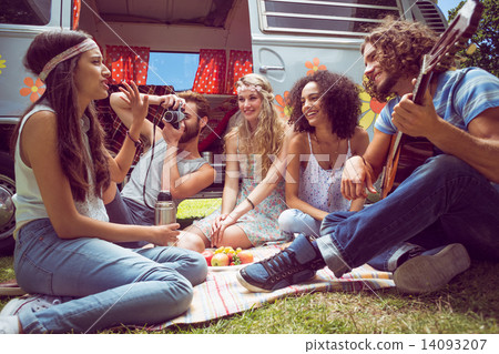 Hipster friends by camper van at festival 14093207