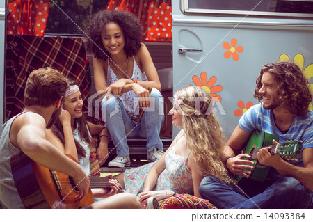 Hipster friends by camper van at festival 14093384