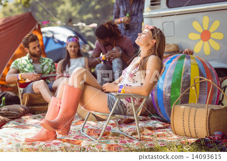 Carefree hipster having fun on campsite 14093615