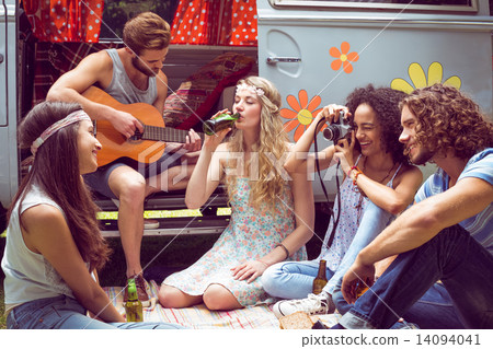 Hipster friends by camper van at festival 14094041