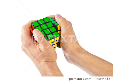 Cube puzzle in hands 14095613