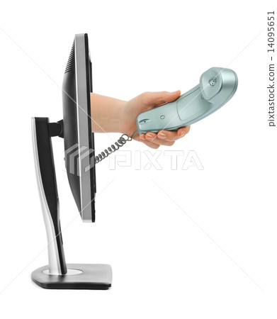 Computer screen and hand with phone 14095651