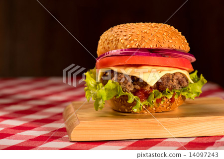 Burger on wooden board Burger on wooden board 14097243