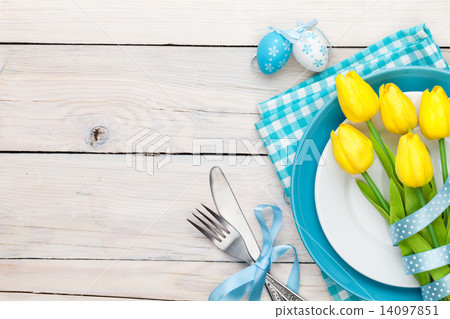 Easter background with yellow tulips and colorful eggs 14097851