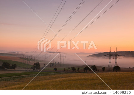 Uncultivated fields in the morning mist Uncultivated fields in the morning mist 14099230