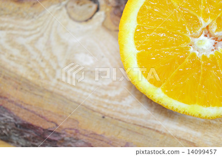 One half of an orange close up 14099457